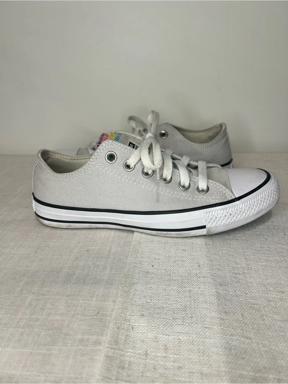 Converse Low Top Sneakers in Light Gray with Rainbow Tongue